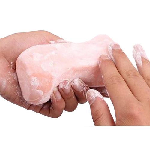 Applying renewal talcum powder alternative onto a TPE male masturbator pocket pussy